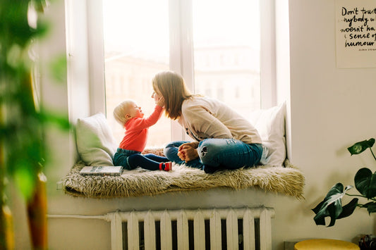 child safety lock for doors - baby touching mom's face