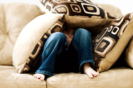 door childproof lock - child hiding under pillows