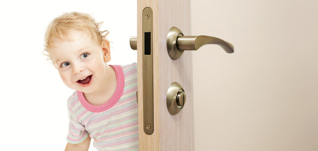 childproof door lock - toddler looking behind door