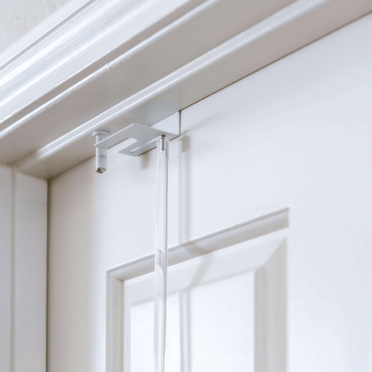 GlideLok extension rod installed on door